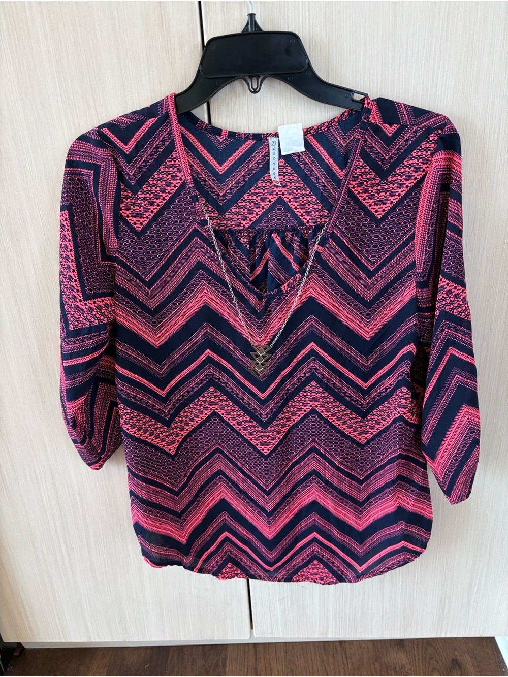 Discreet Women’s Chevron Print V-Neck Blouse in Pink and Navy